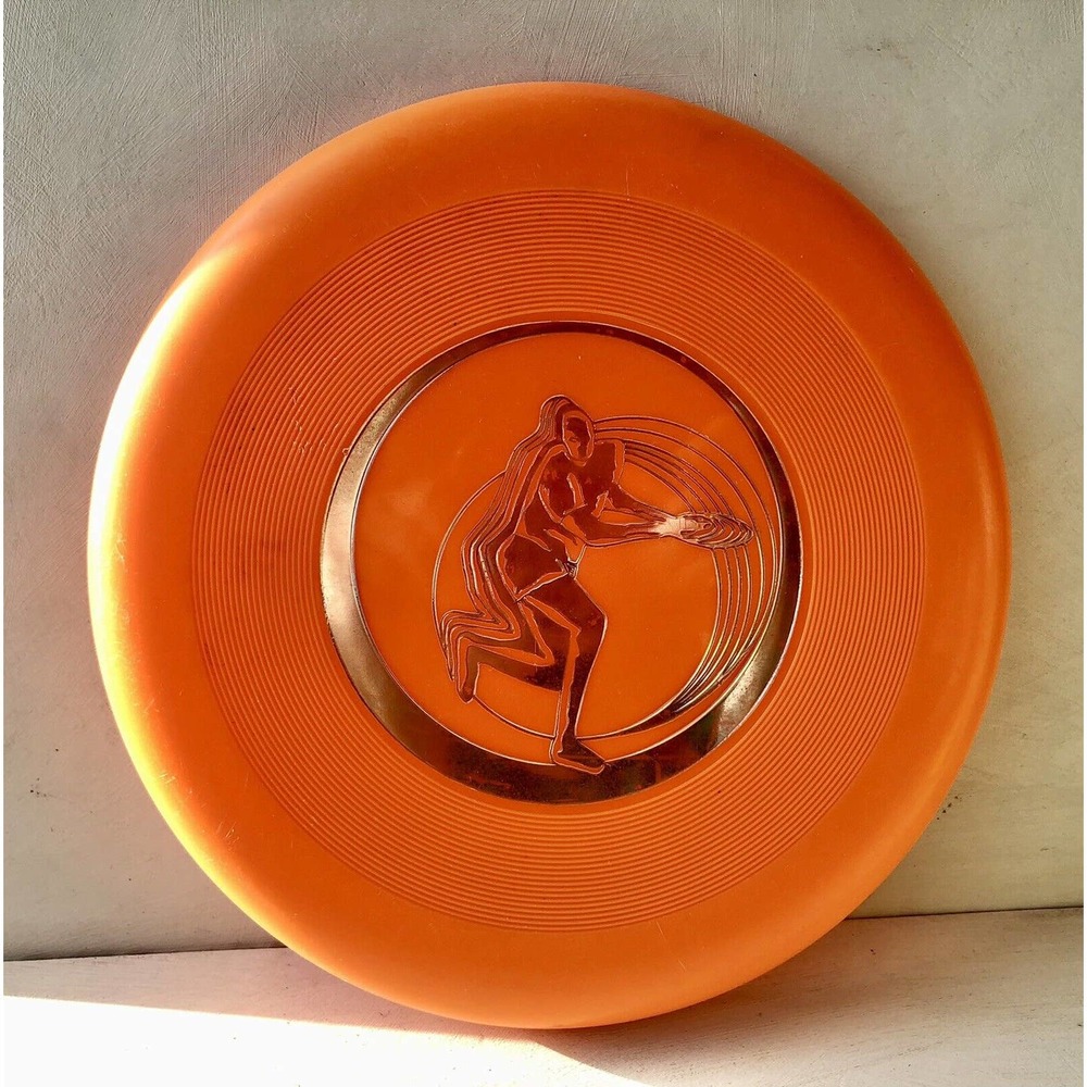 Vintage Frisbee Orange Plastic Silver Center Graphic Player Throwing Unbranded